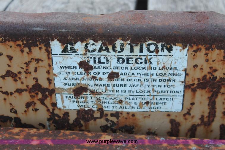 image for item D8261 2001 Towmaster T-12DDT tilt deck trailer