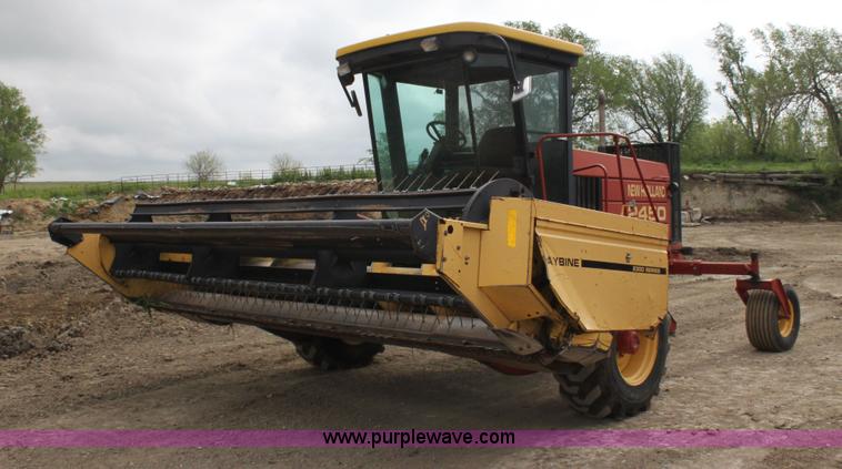 image for item AE9234 1997 New Holland 2450 self-propelled swather