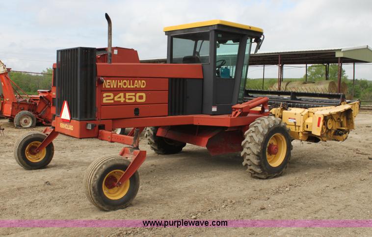 image for item AE9234 1997 New Holland 2450 self-propelled swather