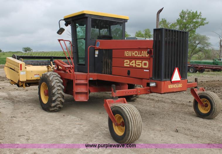 image for item AE9234 1997 New Holland 2450 self-propelled swather