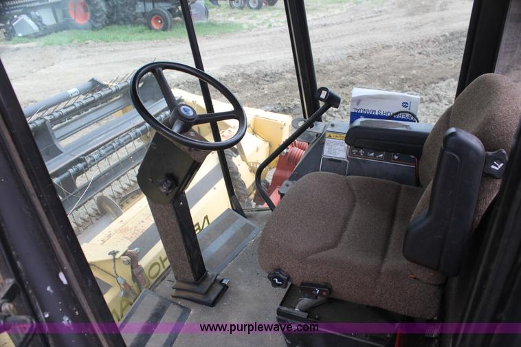 image for item AE9234 1997 New Holland 2450 self-propelled swather