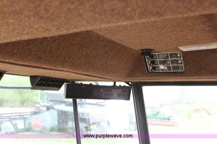 image for item AE9234 1997 New Holland 2450 self-propelled swather