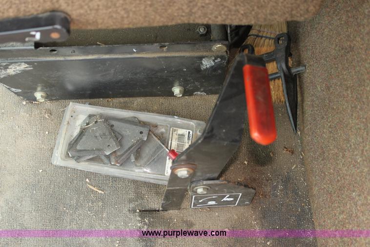 image for item AE9234 1997 New Holland 2450 self-propelled swather