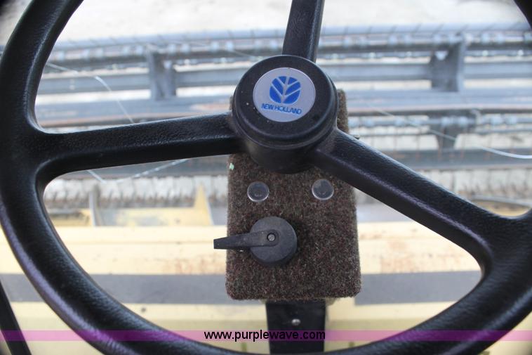 image for item AE9234 1997 New Holland 2450 self-propelled swather