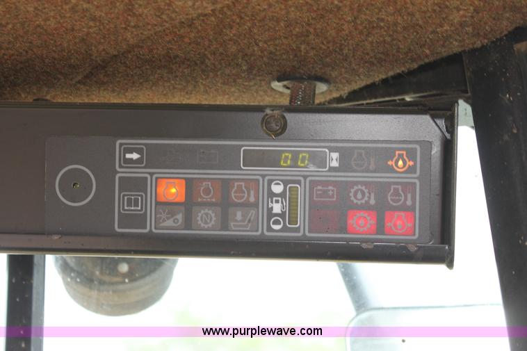 image for item AE9234 1997 New Holland 2450 self-propelled swather