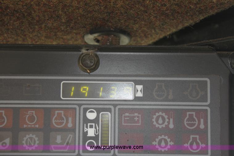 image for item AE9234 1997 New Holland 2450 self-propelled swather