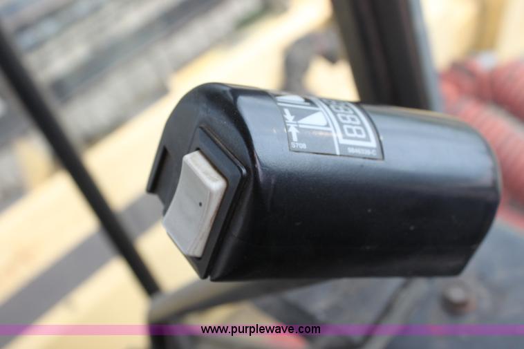 image for item AE9234 1997 New Holland 2450 self-propelled swather