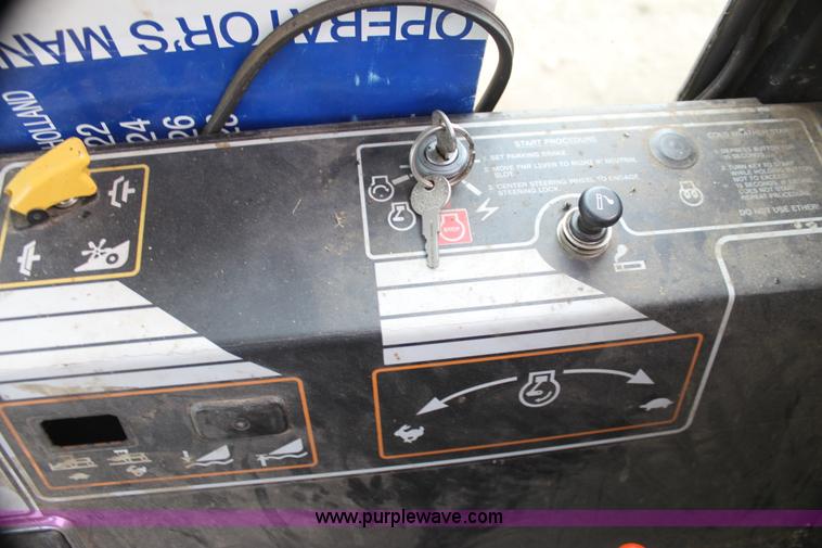 image for item AE9234 1997 New Holland 2450 self-propelled swather