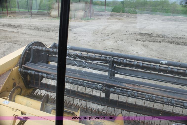 image for item AE9234 1997 New Holland 2450 self-propelled swather