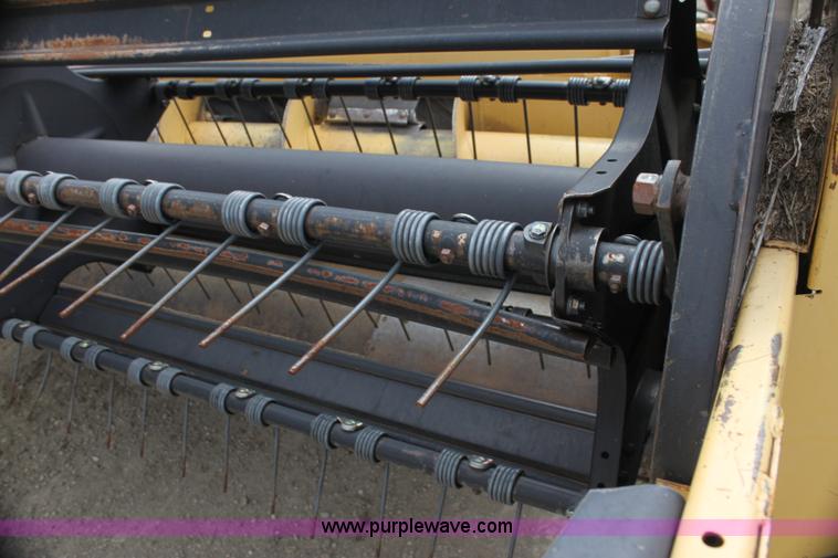 image for item AE9234 1997 New Holland 2450 self-propelled swather