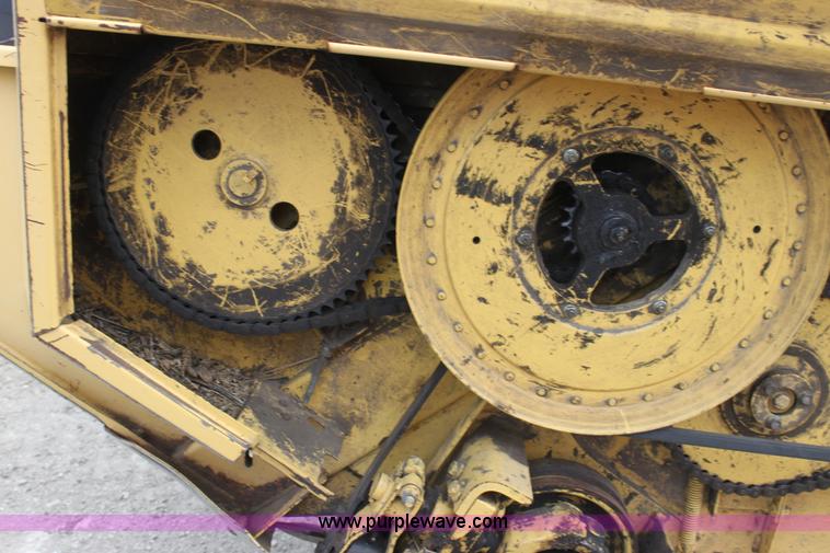 image for item AE9234 1997 New Holland 2450 self-propelled swather