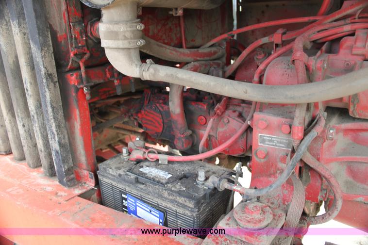 image for item AE9234 1997 New Holland 2450 self-propelled swather