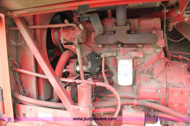 image for item AE9234 1997 New Holland 2450 self-propelled swather