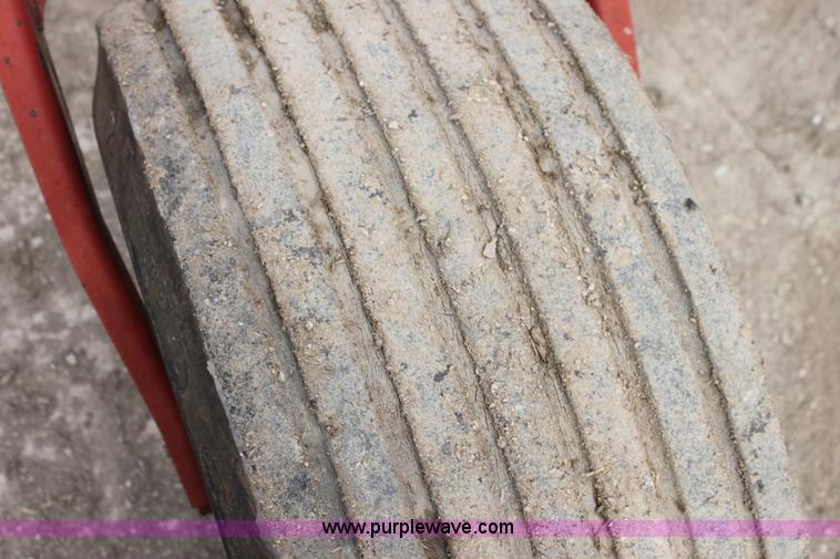 image for item AE9234 1997 New Holland 2450 self-propelled swather