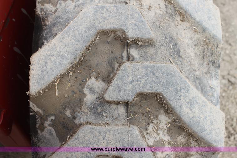 image for item AE9234 1997 New Holland 2450 self-propelled swather