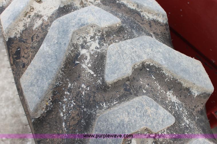 image for item AE9234 1997 New Holland 2450 self-propelled swather