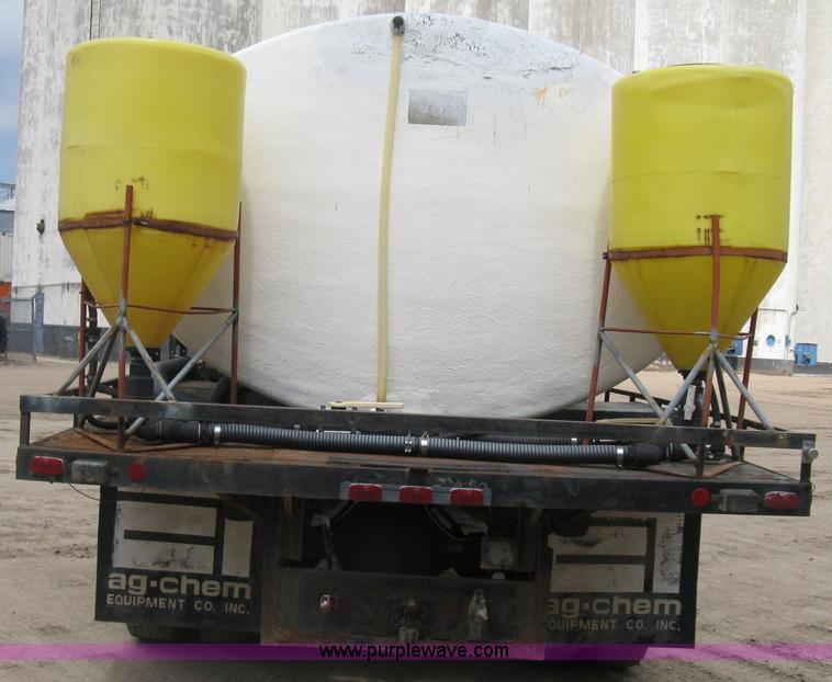 image for item D8299 1982 International 1954 flatbed tender truck