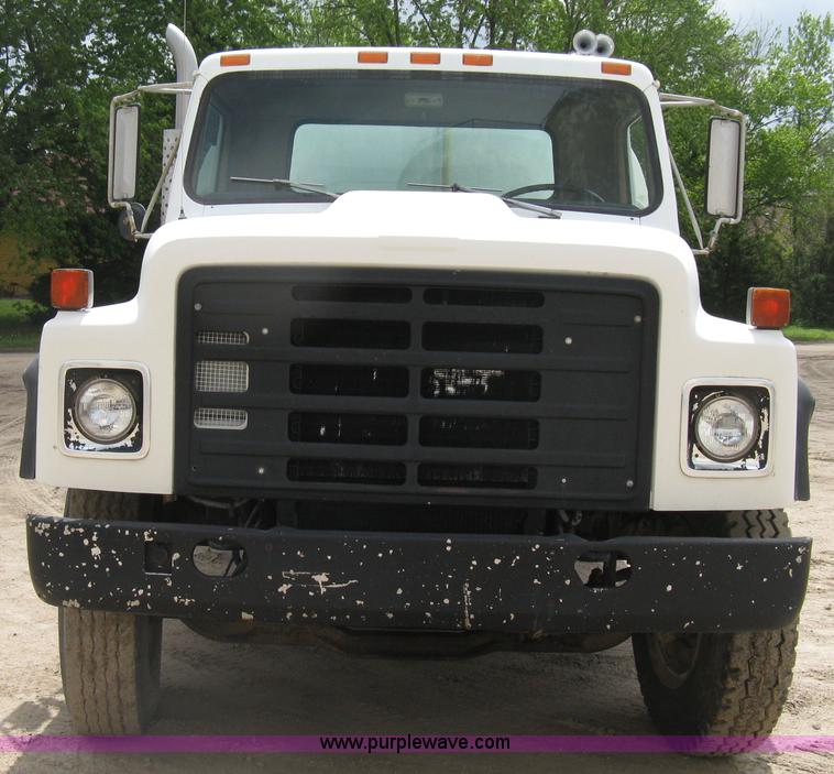 image for item D8299 1982 International 1954 flatbed tender truck