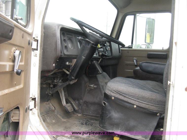 image for item D8299 1982 International 1954 flatbed tender truck