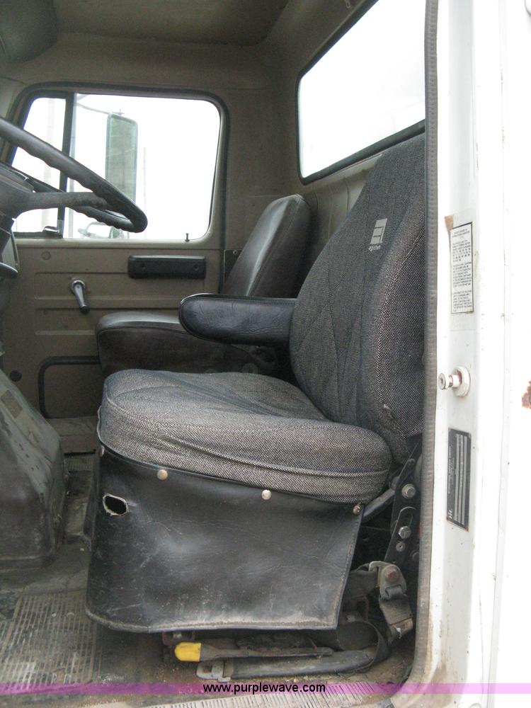 image for item D8299 1982 International 1954 flatbed tender truck