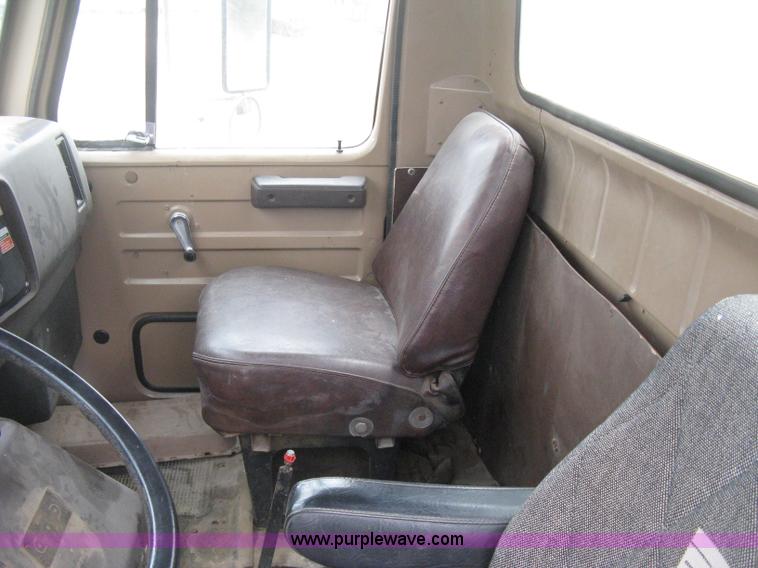 image for item D8299 1982 International 1954 flatbed tender truck