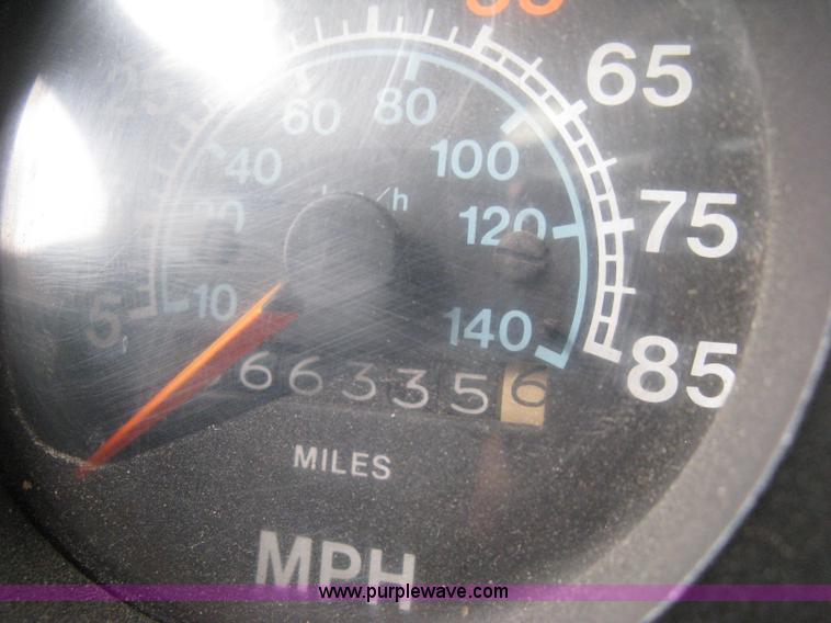 image for item D8299 1982 International 1954 flatbed tender truck