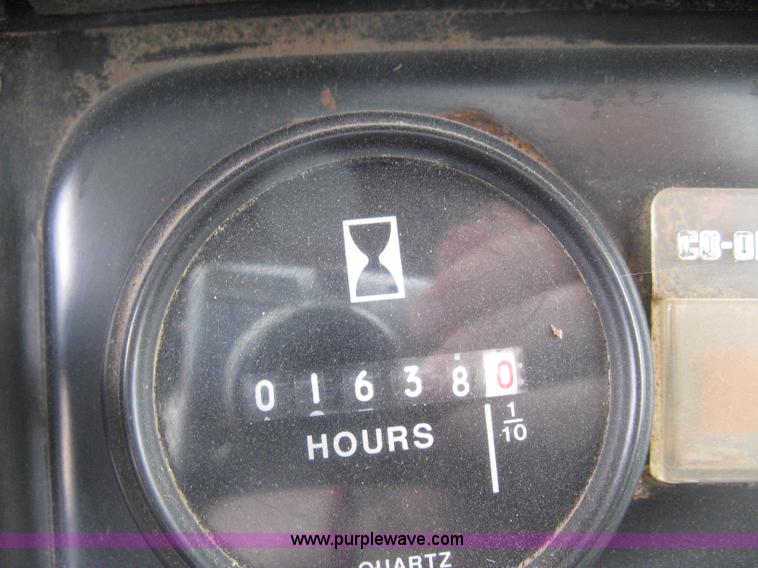 image for item D8299 1982 International 1954 flatbed tender truck