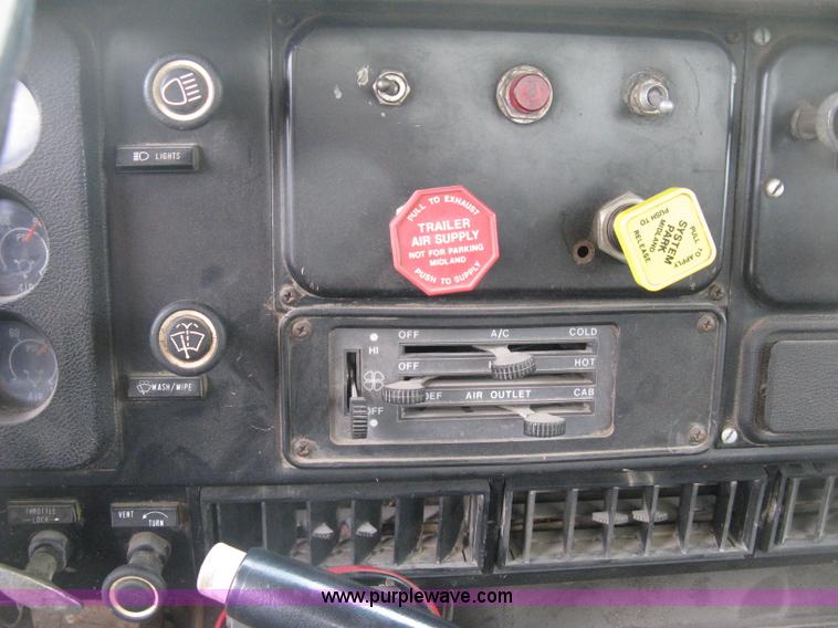 image for item D8299 1982 International 1954 flatbed tender truck