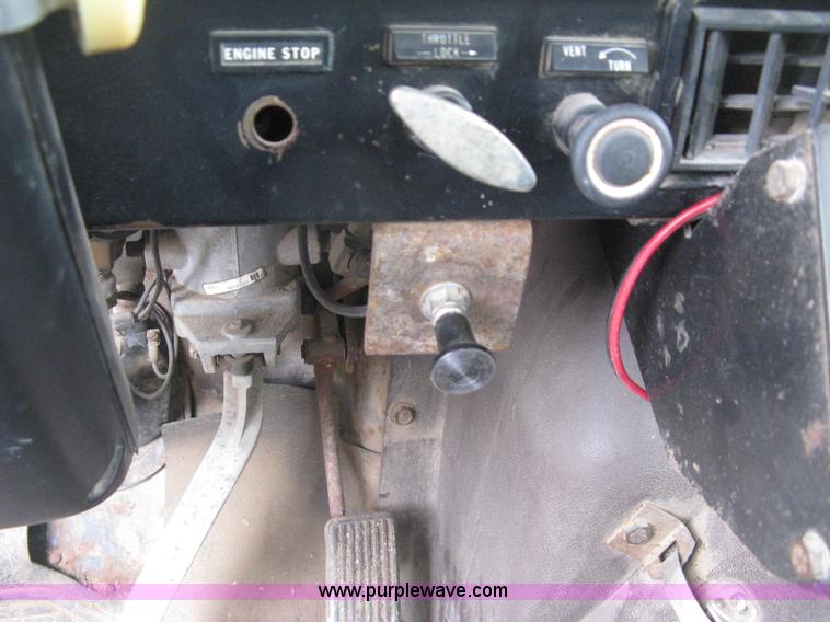 image for item D8299 1982 International 1954 flatbed tender truck