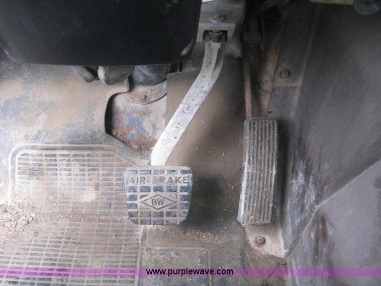 image for item D8299 1982 International 1954 flatbed tender truck