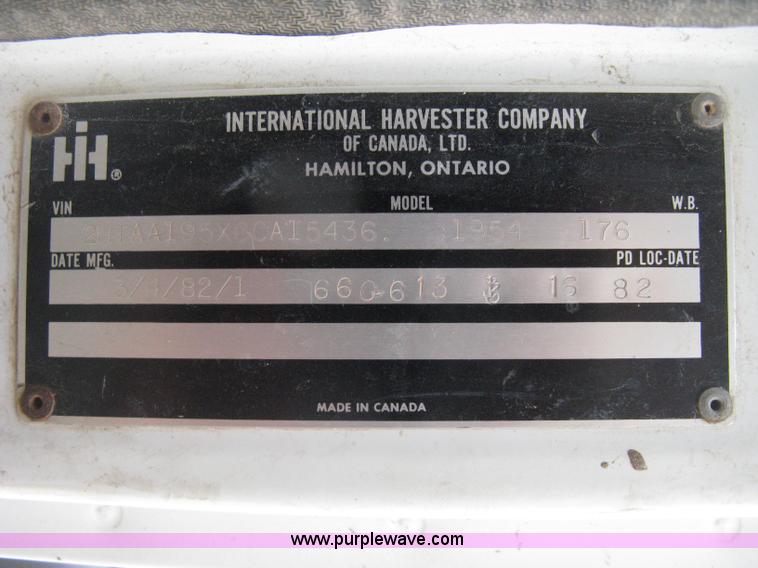 image for item D8299 1982 International 1954 flatbed tender truck