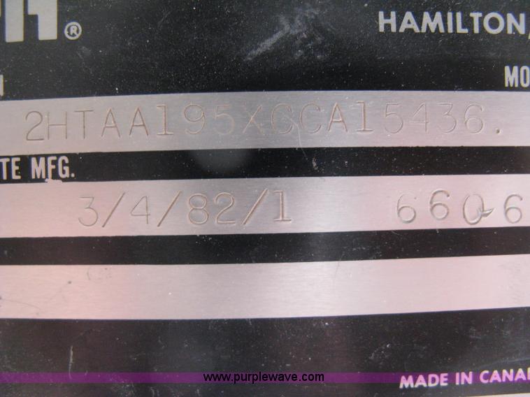 image for item D8299 1982 International 1954 flatbed tender truck