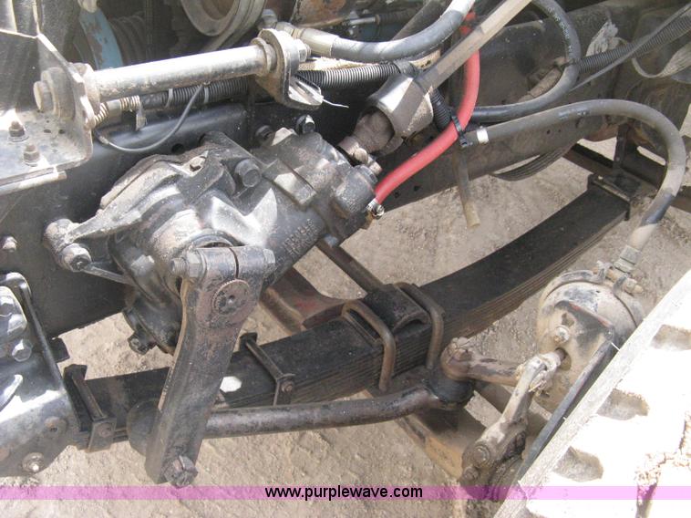 image for item D8299 1982 International 1954 flatbed tender truck