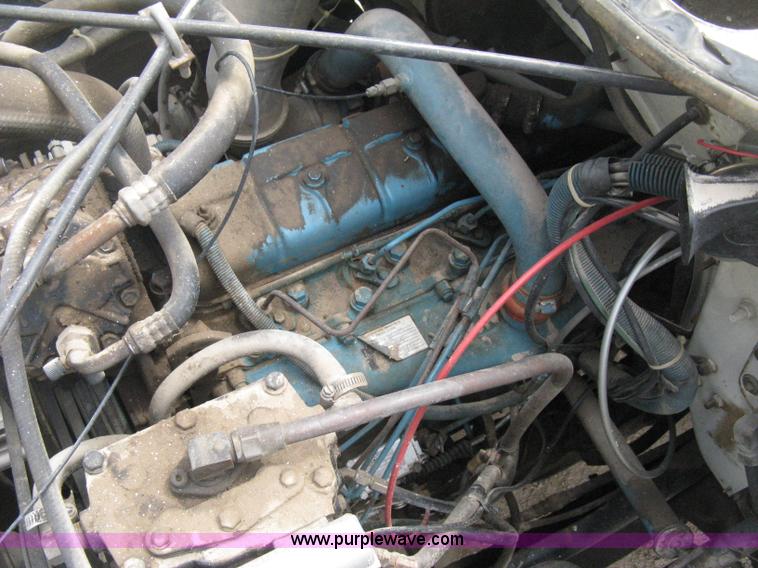 image for item D8299 1982 International 1954 flatbed tender truck