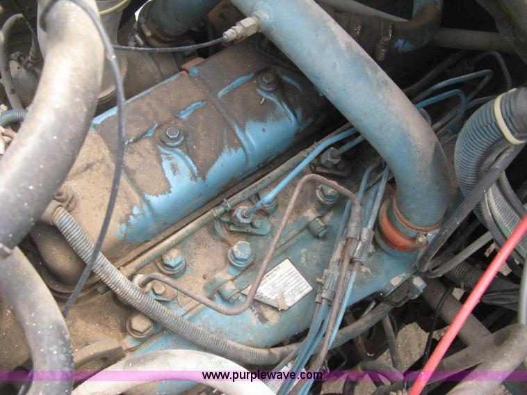 image for item D8299 1982 International 1954 flatbed tender truck