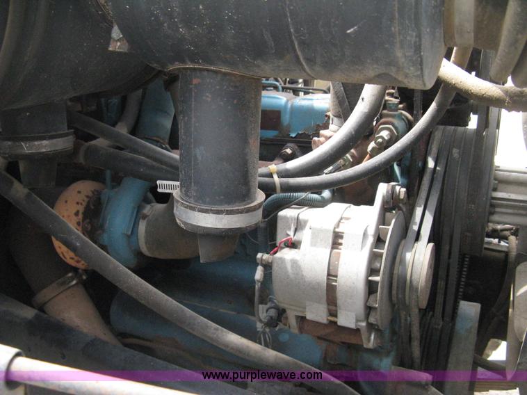 image for item D8299 1982 International 1954 flatbed tender truck