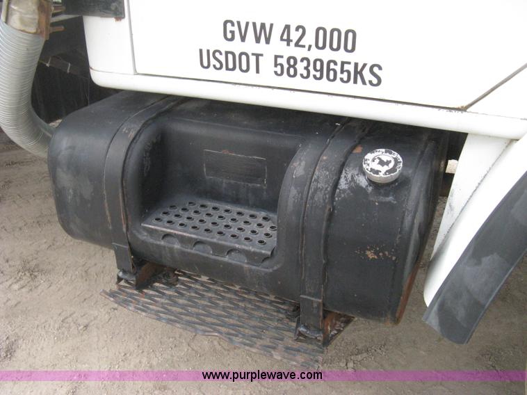 image for item D8299 1982 International 1954 flatbed tender truck