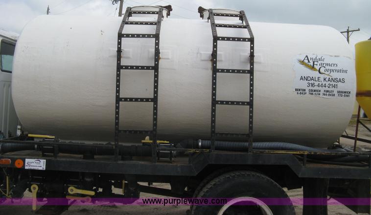 image for item D8299 1982 International 1954 flatbed tender truck