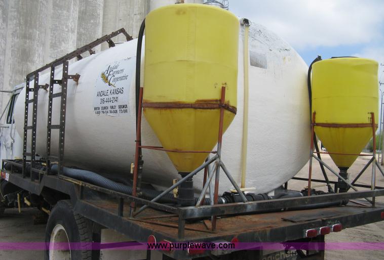 image for item D8299 1982 International 1954 flatbed tender truck