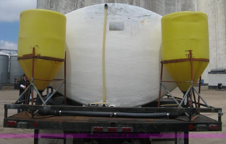 image for item D8299 1982 International 1954 flatbed tender truck