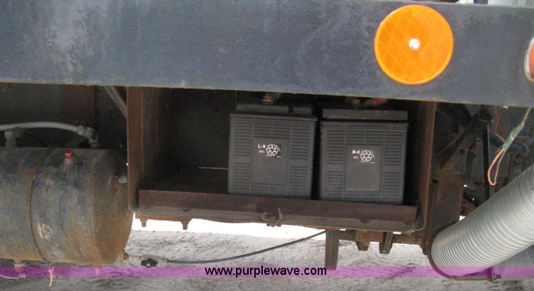 image for item D8299 1982 International 1954 flatbed tender truck