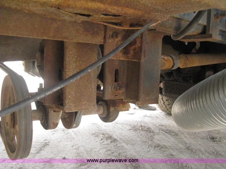 image for item D8299 1982 International 1954 flatbed tender truck