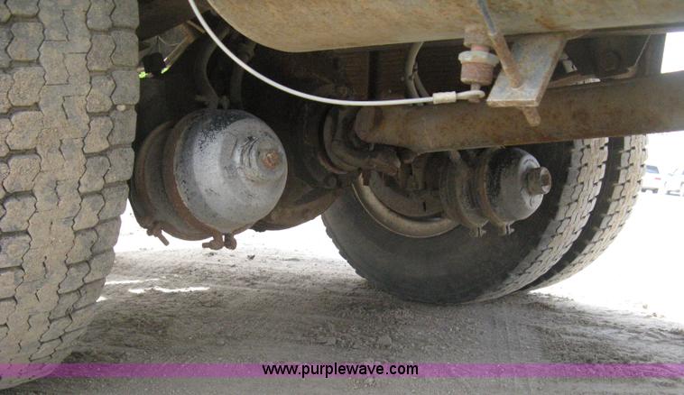 image for item D8299 1982 International 1954 flatbed tender truck