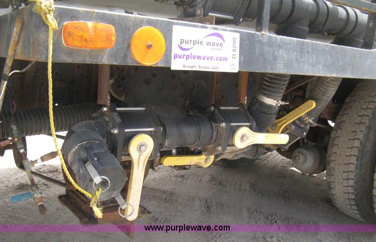 image for item D8299 1982 International 1954 flatbed tender truck