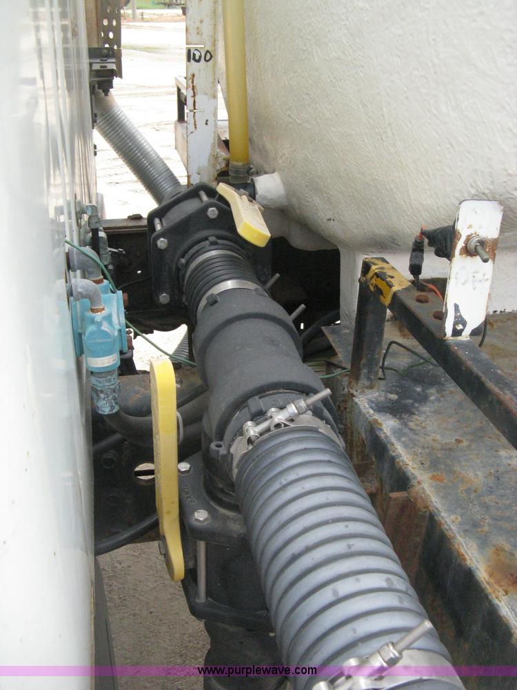 image for item D8299 1982 International 1954 flatbed tender truck