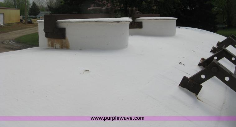 image for item D8299 1982 International 1954 flatbed tender truck