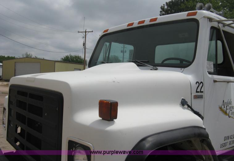 image for item D8299 1982 International 1954 flatbed tender truck