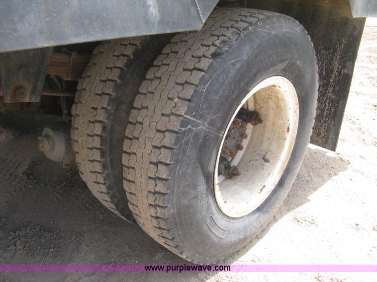 image for item D8299 1982 International 1954 flatbed tender truck