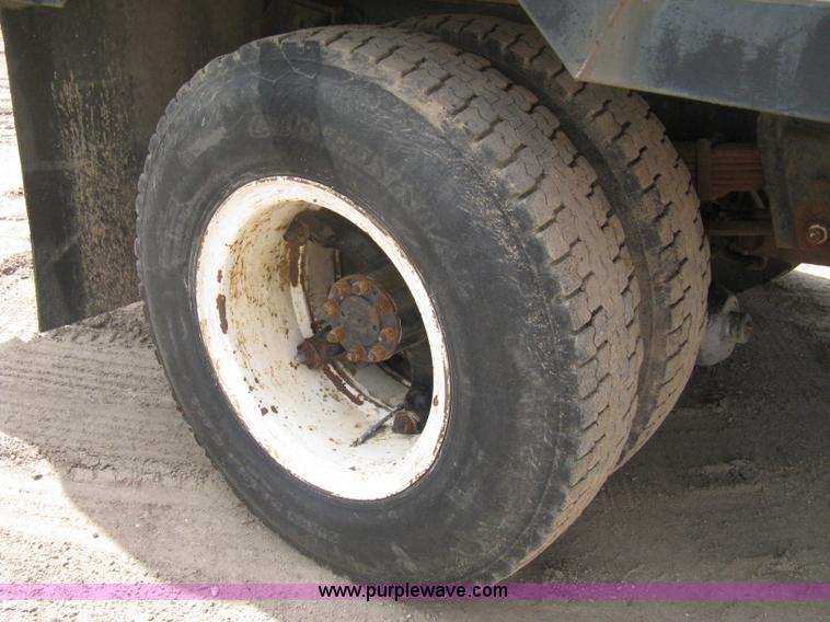 image for item D8299 1982 International 1954 flatbed tender truck