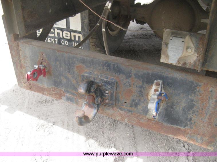 image for item D8299 1982 International 1954 flatbed tender truck